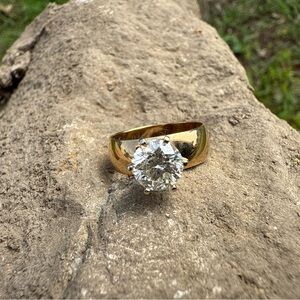 1 Carat White Diamond Cathedral Solitaire Ring Set In 14 Karat Yellow Gold